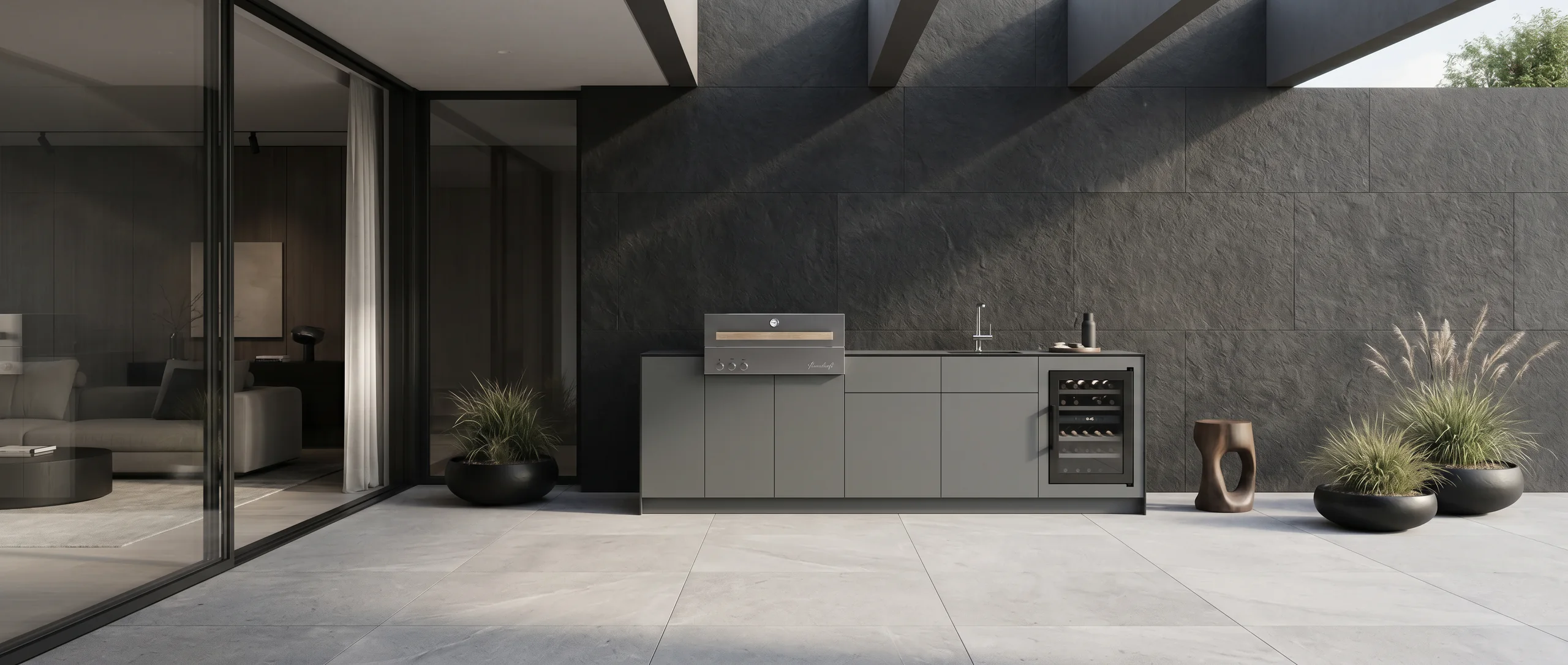 Graphite Infinity outdoor kitchen in modern architecture with a calm premium atmosphere.